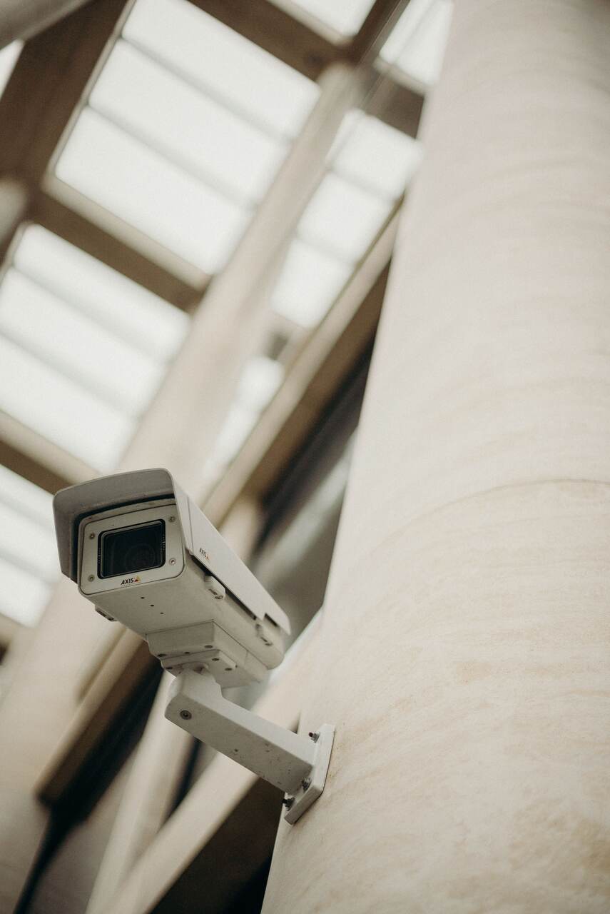 Bullet camera mounted on a wall bracket